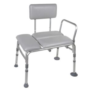 The 12005KD-1 is a gray bath transfer bench with a padded backrest and seat, four legs with suction cup feet, and a single side railing for support.