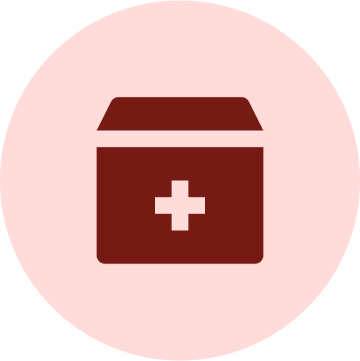 Icon of a medical kit box with a cross on it, depicted in dark red on a light pink circular background.
