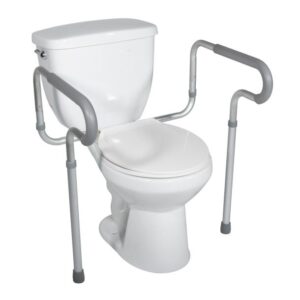 Toilet with safety grab bars for support and stability.