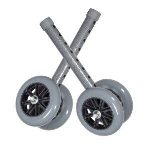 A pair of gray turbocharger wheels with attached shafts.
