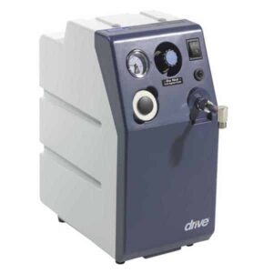 A compact medical device with control knobs and a gauge on the front panel.