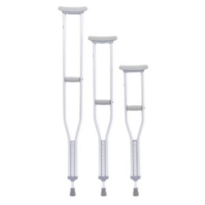 Three different-sized crutches standing upright on a white background.