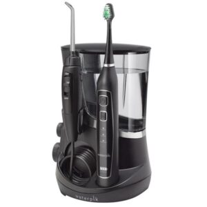 Electric oral hygiene kit with toothbrush, water flosser, and additional dental tools.