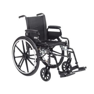 A standard black manual wheelchair with large rear wheels and footrests.